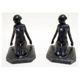1061	CAST METAL BOOKENDS W/IMAGE OF NUDE WOMAN KNEELING BACKWARDS, APPROXIMATELY 5 IN X 5 IN X 6 IN 