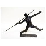 1062	CAST BRONZE IMAGE OF MAN THROWING JAVELIN, APPROXIMATELY 2 IN X 18 IN X 9 1/2 IN HIGH, SIGNED K