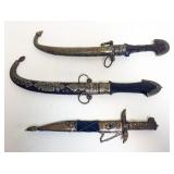 1082	3 MOROCCAN DAGGERS, LARGEST APPROXIMATELY 16 IN