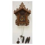 1123	CARVED CUCKOO CLOCK, SOME LOSS TO CARVING, SOLD AS FOUND FOR RESTORATION, APPROXIMATELY 12 IN X