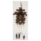 1125	CARVED CUCKOO CLOCK, SOME LOSS TO CARVING, SOLD AS FOUND FOR RESTORATION, APPROXIMATELY 17 IN X