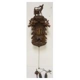 1128	CARVED CUCKOO CLOCK, SOME LOSS TO CARVING, SOLD AS FOUND FOR RESTORATION, APPROXIMATELY 15 IN X