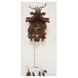 1129	CARVED CUCKOO CLOCK, SOME LOSS TO CARVING, SOLD AS FOUND FOR RESTORATION, APPROXIMATELY 14 IN X
