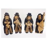 1140	GROUP OF 4 WOOD CARVED MUSICIANS, EACH APPROXIMATELY 10 1/2 IN HIGH