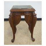 1221	HEAVILY CARVED TABLE WITH GREEN MARBLE INSET TOP, APPROXIMATELY 21 IN X 21 IN X 30 IN H