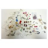 1241	GROUP OF ASSORTED COSTUME JEWELRY INCLUDING NECKLACES, EARRINGS, PINS, ETC.
