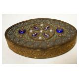1262	ANTIQUE OVAL ENAMELED DRESSER BOX, APPROXIMATELY 3 1/2 IN X 2 1/2 IN X 1/2 IN