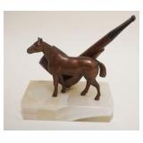 1012	CAST METAL HORSE PIPE HOLDER MOUNTED ON ONYX BASE W/A BRIAR WOOD PIPE, APPROXIMATELY 5 IN X 3 I