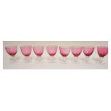 1056	8 CRANBERRY TO CLEAR GOBLETS, APPROXIMATELY 4 1/2 IN HIGH
