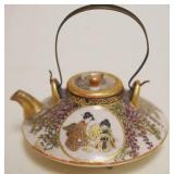 1098	MINIATURE SATSUMA TEAPOT