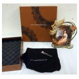 1155	JAY STRONGWATER JEWELED DRESSER FRAME WITH FLOWERS AND BUTTERFLY, APPROXIMATELY 8 IN X 11 IN OV