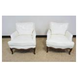 1225	PAIR OF WHITE LEATHER ARM CHAIRS WITH BRASS TACK ACCENTS