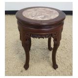 1242	ROUND ASIAN STAND WITH BROWN MARBLE INSET TOP, PIERCED CARED SKIRT, APPROXIMATELY 16 IN X 20 IN
