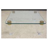 1126	MID CENTURY MODERN GLASS COCKTAIL TABLE WITH LUCITE COLUMN LEGS, APPROXIMATELY 42 IN SQ X 16 IN