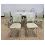 1140	MID CENTURY MODERN FORMICA AND CHROME TABLE WITH 6 CHAIRS AND 1 LEAF, TABLE APPROXIMATELY 48 IN