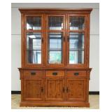 1152	CONTEMPORARY MISSION STYLE OAK 2 PART BREAKFRONT WITH MIRROR BACK AND INTERIOR LIGHTS, APPROXIM