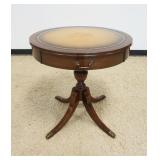 1168	MAHOGANY LEATHER TOP DRUM TABLE APPROXIMATELY 28 IN X 28 IN H, SOME FADING TO LEATHER TOP