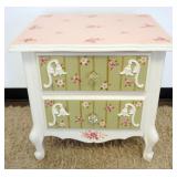 1177	FIGURAL PAINT DECORATED 2 DRAWER STAND, APPROXIMATELY 19 IN X 24 IN X 25 IN H
