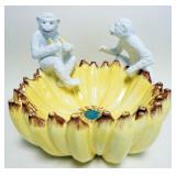 1188	LARGE INTRADA MONKEY EATING BANANAS BOWL, APPROXIMATELY 18 IN X 14 IN H