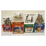 1261	GROUP OF 4 PORCELAIN SANTAS WORKBENCH COLLECTION BUILDINGS IN BOXES