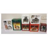 1262	GROUP OF 4 PORCELAIN SANTAS WORKBENCH COLLECTION BUILDINGS IN BOXES