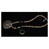 1073	TWO PIECES STERLING W/ GOLD ACCENTS JEWELRY. LOT INCLUDES STERLING RING W/ 14K GOLD ACCENTS & N