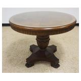 1103	CARVED OAK PEDESTAL TABLE W/BURLED & BANDED TOP, PAW FEET BASE, APPROXIMATELY 39 IN X 31 1/2 IN