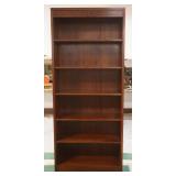 1126	STICKLEY BOOKCASE, SOLID BLACK CHERRY W/4 ADJUSTABLE SHELVES, APPROXIMATELY 34 IN X 12 IN X 81 