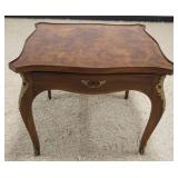 1142	KARGES ONE DRAWER LAMP TABLE W/BURLED WALNUT TOP & METAL MOUNTS, APPROXIMATELY 28 IN SQUARE X 2