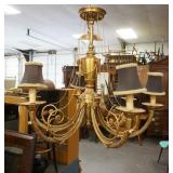1183	LARGE GILT METAL CHANDELIER W/SCROLLED ARMS & RAMS HEADS, APPROXIMATELY 32 IN HIGH