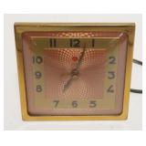1252	VINTAGE DECO STYLE GE ELECTRIC CLOCK, APPROXIMATELY 5 IN X 5 1/2 IN