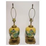 1031	PAIR OF ASIAN POTTERY TABLE LAMPS W/RELIEF IMAGES OF STORKS & FLOWERS, ONE W/HAIRLINE, EACH APP