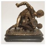 1041	CHALK STATUE IN BRONZE FINISH OF MEN WRESTLING, APPROXIMATELY 15 IN X 9 IN X 15 IN HIGH