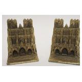 1051	CAST METAL BOOKENDS DEPICTING A CATHEDRAL IN GILT FINISH, APPROXIMATELY 5 1/4 IN HIGH