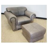 1108	GREY LEATHER ARMCHAIR W/OTTOMAN, APPROXIMATELY 39 IN X 45 IN X 29 IN HIGH