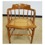1128	OAK BENTWOOD CANE SEAT CHAIR, BARREL BACK