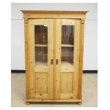 1140	COUNTRY SCRUB PINE 2 DOOR CABINET W/2 INTERIOR SHELVES & REEDED COLUMN SIDES, APPROXIMATELY 48 