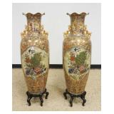 1143	PAIR OF ASIAN FLOOR URNS ON PEDESTALS EACH W/IMAGES OF PEACOCKS & BIRDS W/GILT DRAGONS ON SIDES, APPROXIMATELY 50 IN HIGH