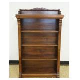 1145	WALNUT VICTORIAN BOOKCASE W/REEDED COLUMN SIDES & SCROLLED GALLERY TOP, APPROXIMATELY 34 IN X 1