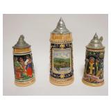 1194	GROUP OF 3 VINTAGE GERMAN BEER STEINS W/PEWTER LIDS, TALLEST APPROXIMATELY 12 IN HIGH