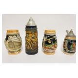 1196	GROUP OF 4 VINTAGE GERMAN STEINS, 2 W/PEWTER TOPS, TALLEST APPROXIMATELY 10 IN HIGH