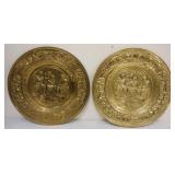 1251	PAIR OF LARGE BRASS EMBOSSED WALL CHAARGERS DEPICTING PUB SCENE, APPROXIMATELY 22 1/2 IN
