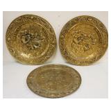 1252	GROUP OF LARGE BRASS EMBOSSED CHARGERS, INCLUDING 1 PAIR, TAVERN SCENES, APPROXIMATELY 28 1/2 I