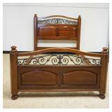 1148	SOLID CHERRY QUEEN SIZE BED W/ORNATE IRON GALLERY INSET, APPROXIMATELY 66 IN X 90 IN X 59 IN HI