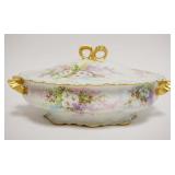1011	LIMOGES HAND PAINTED COVERED DISH, FLORAL, OVAL W/GILD RIBBON & BOW HANDLES, ARTIST SIGED & DAT
