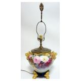 1031	PORCELAIN HAND PAINTED LAMP W/GILT LION HEADS & ROSES ALL OVER, PAW FEET, LAMP HAS HAIRLINE