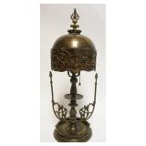 1043	BACCHUS METAL TABLE LAMP WITH ORNATE METAL MICA LINED SHADE WITH IMAGES OF BACCHUS MASK AND GRAPE VINE CLUSTERS, APPROXIMATELY 21 1/2 IN H