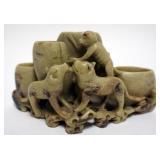 1047	CARVED SOAP STONE VASE WITH IMAGES OF MONKEY CLIMBING TO TOP AND 2 DOGS AT BASE, APPROXIMATELY 