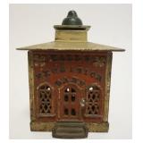 1053	ANTIUE MECHANICAL CAST IRON BANK, *HALLS EXCELSIOR BANK*, APPROXIMATELY 4 IN SQ X 5 1/2 IN H