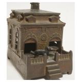 1054	ANTIQUE MECHANICAL CAST IRON BANK, DOG ON TURNTABLE ACTIVATED BY CRANK, APPROXIMATELY 6 IN X 4 